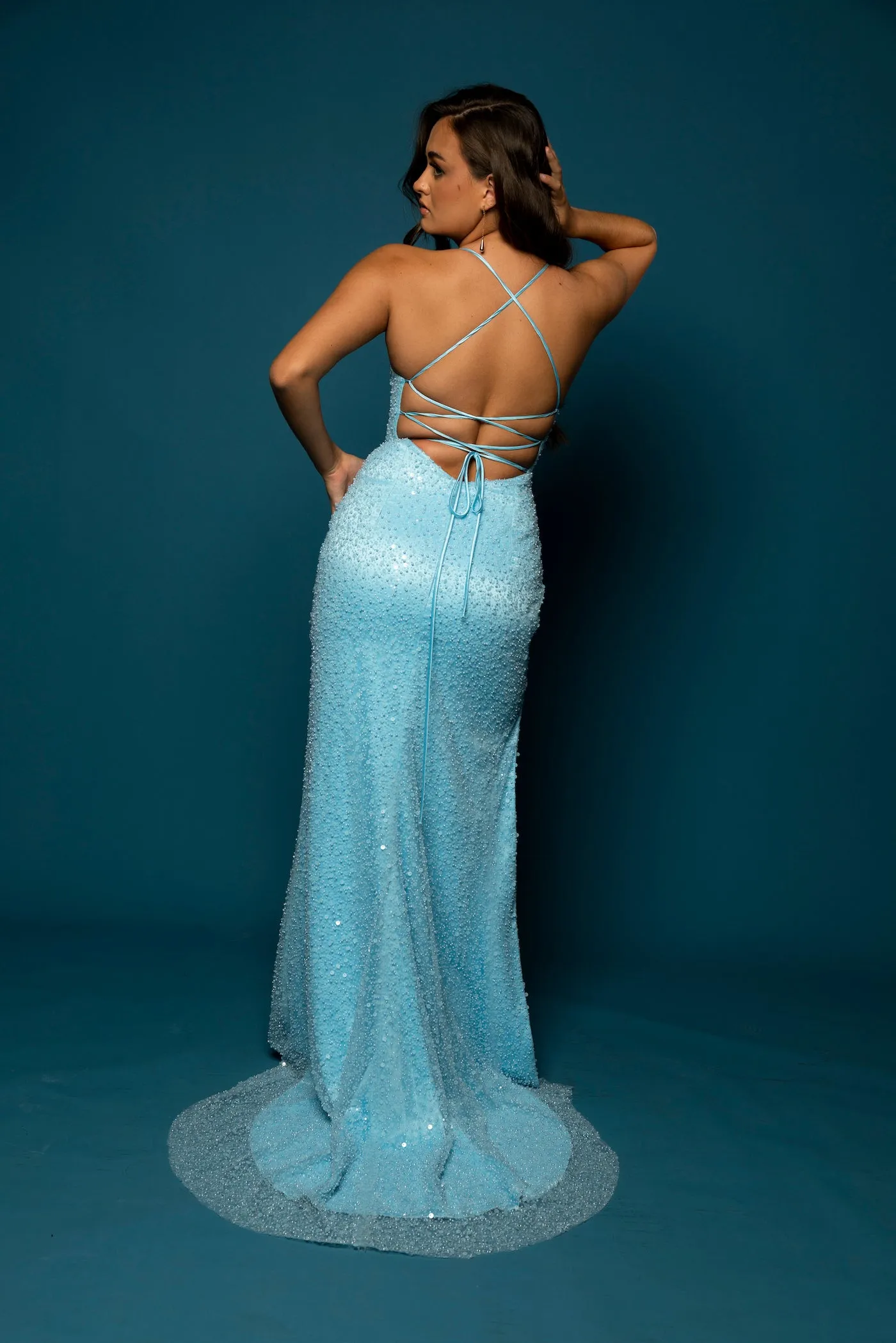 Baby blue beaded dress with crescent moom neckline and high slit for hire