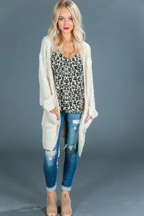 Champagne and Cozy Cardigan